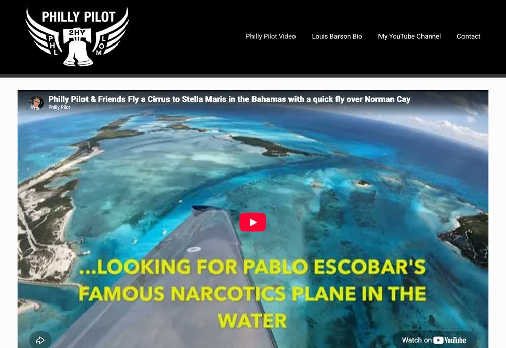Philly Pilot website with a winged Liberty Bell logo on a black header and a featured YouTube video of a Cirrus flight over the Bahamas